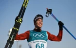 Le Suisse Dario Cologna savoure sa victoire sur le 15 km libre de ski de fond aux JO, le 16 février 2018 à Pyeongchang