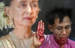 Un manifestant couvert de faux sang, effectue le salut à trois doigts, symbole du mouvement pro-démocratie, devant un portrait de la dirigeante déchue Aung San Suu Kyi, lors d'une manifestation à Bangkok, en Thaïlande, le 1er février 202, pour marquer le 3e anniversaire du coup d'Etat en Birmanie
