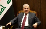Une photo obtenue par le Parlement irakien montre le président irakien élu Abdel Latif Rachid à la session du Parlement à Bagdad, le 13 octobre 2022