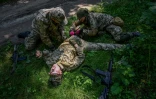 Des civils ukrainiens participent à un entraînement militaire à Lviv, en Ukraine, le 3 août 2022, en pleine guerre entre l'Ukraine et la Russie