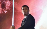 L'acteur britannique John Boyega lors d'un événement promotionnel autour du dernier opus "Star Wars" à Tokyo, le 10 décembre 2015