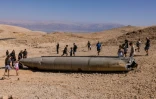 Des restes d'un missile iranien dans le désert du Néguev, près d'Arad, en Israël, le 3 octobre 2024 après une attaque de Téhéran 