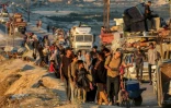 Des Palestiniens fuient la ville de Gaza en direction du sud, le 13 septembre 2025