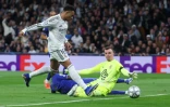 L'attaquant français du Real Madrid Kylian Mbappé (à gauche), auteur d'un doublé contre son ancien club Monaco en Ligue des champions, le 20 janvier 2026