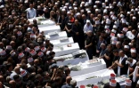 Funérailles des victimes d'une frappe imputée au Hezbollah libanais sur le plateau syrien du Golan annexé, dans la ville druze de Majdal Shams le 28 juillet 2024