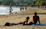 Des touristes sur une plage de San Juan del Sur, le 25 avril 2023 au Nicaragua