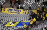 Des supporters suédois lors du match arrêté au stade Baudouin contre la Belgique, en raison d'un attentat à Bruxelles, le 16 octobre 2023