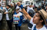 Des Nicaraguayens manifestent devant leur ambassade au Costa Rica, le 22 décembre 2018, pour dénoncer l'arrestation de deux journalistes critiques du président Daniel Ortega