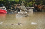 Un statue de Buddha dans une zone indondée à Roquebrune-sur-Argens, le 23 novembre 2019