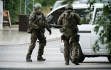 Des policiers sécurisent un périmètre après la fusillade de Munich, le 22 juillet 2016 