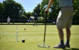 Players in action at Sussex County Croquet Club on the south coast of England