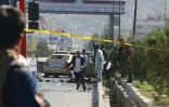 Des forces de sécurité afghanes inspectent le lieu d'un attentat à Kaboul, le 9 septembre 2018