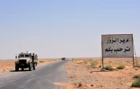 Des véhicules des forces armées syriennes à l'entrée de Deir Ezzor, le 3 septembre 2017