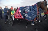 Le trotteur français Davidson du Pont drivé par Nicolas Bazire a remporté  le 101e Prix d'Amérique, l'hippodrome de Paris-Vincennes, le 30 janvier 2022