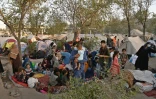 Des familles, ayant fui les combats entre talibans et forces de sécurité afghanes à Kunduz, Takhar et Baghlan, installées dans un campement à Kaboul, le 11 août 2021