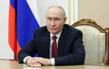 Photo diffusée par l'agence officielle Sputnik le 16 septembre 2026 montrant le président russe Vladimir Poutine lors d'une allocution télévisée