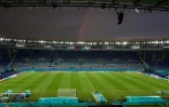 Un arc-en-ciel surplombe le Stadio Olimpico, le 10 juin 2021 à Rome, à la veille du match d'ouverture de l'Euro 2020 entre l'Italie et la Turquie