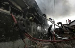 Des pompiers sur le site de l'explosion d'une usine Ă Tongi au nord de Dacca, au Bangladesh, le 10 septembre 2016