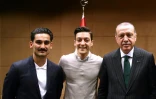 Les footballeurs allemands Ilkay Gundogan et Mesut Özil et le président turc Recep Tayyip Erdogan à Londres le 13 mai 2018