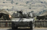 Un blindé israélien prend position le 9 mai 2018 près de la ligne de démarcation avec la Syrie dans la partie du Golan occupée par Israël.
