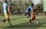 Photo de joueurs d'une équipe palestinienne de football rassemblant des personnes amputées, pour la plupart dans le cadre du conflit avec Israël, prise le 9 juillet 2018 à Deir al Balah, dans la bande de Gaza