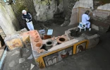 Dans le quartier du thermopolium, sorte de "fast-food" de rue dans la Rome antique, le 25 janvier 2021 sur le site archéologique de Pompéi, près de Naples