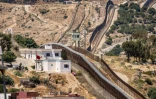 Vue de la frontière séparant l'enclave espagnole de Melilla de la ville marocaine de Nador, le 25 juin 2022