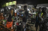 Opération de contrôle sur un marché à Abidjan, le 22 mars 2020