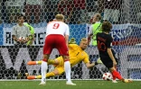 Le capitaine croate Luka Modric rate un penalty, stoppé par le gardien du Danemark Kasper Schmeichel à Nijni Novgorod, le 1 er juillet 2018
