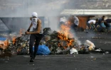 Des Palestiniens lors d'incidents le 20 octobre 2015 à Al-Bireh près de Ramallah