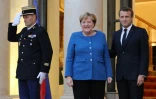 Le président Emmanuel Macron et la chancelière allemande Angela Merkel sur le perron de l'Elysée, le 13 octobre 2019 à Paris
