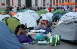 Des manifestants installés dans des tentes sur la Puerta del Sol à Madrid pour protester contre les expulsions de logements, le 27 septembre 2026