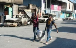 Des habitants quittent leur maison en raison de la violence des gangs, Ă Port-au-Prince le 9 mars 2024