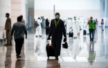 Photo fournie par le ministère saoudien du Hajj, le 25 juillet 2020, un grope de pèlerins arrivant à l'aéroport de Jeddah, en Arabie saoudite
