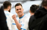 La joie de l'attaquant polonais de Marseille, Arkadiusz Milik, après avoir ouvert le score à domicile contre Brest, lors de leur match de Ligue 1, le 13 mars 2021 au Stade Vélodrome