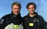 Yann Elies (g) and Charlie Dalin posent à bord de leur monocoque Apivia avant la Transat Jacques Vabre, le 10 octobre 2019 à Port-la-Forêt