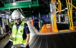Tsuyoshi Habuta, a, superviseur chez CKTS, l'une des sociétés de manutention de l'aéroport international du Kansai, au Japon. Photo prise le 3 septembre 2024

, who supervises baggage operations at CKTS, working in front of the baggage conveyer belt in Kansai International Airport of Osaka Prefecture. Kansai International Airport in Japan can't be held responsible for the less superlative performance of airlines or other stops in a traveller's journey, but it claims its handlers never lose a bag.