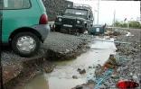 Le cyclone tropical intense est passé à 60 km des côtes ouest de La Réunion le 22 janvier 2002 provoquant d'importants dégâts au réseau routier