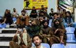 Des Afghans assistent au concours de Mr Afghanistan, le 10 juillet 2024 à Kaboul