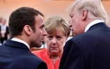 Le président américain Donald Trump, le président français Emmanuel Macron et la chancelière allemande Angela Merkel au sommet du G20 à Hambourg, au nord de l'Allemagne, le 7 juillet 2017
