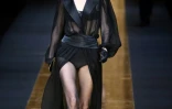 Transparent silk skirts and blouses featured prominently in the all-black collection from Dolce & Gabanna.