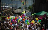 Des participants à la Gay Pride, le 3 juillet 2016 à Cologne