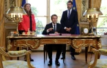 Christophe Castaner,au côté d'Emmanuel Macron et de Nicole Belloubet, lors de la promulgation des projets de loi pour la confiance dans la vie politique, à Paris, le 15 septembre 2017
