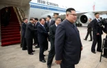 Photo fournie par le ministère de la Communication et de l'Information de Singapour, le 10 juin 2018, du leader nord-coréen Kim Jong Un à son arrivée à l'aéroport