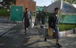 Des Afghans arrivent le 13 septembre 2017 à l'aéroport international de Kaboul après avoir été expulsés d'Allemagne  