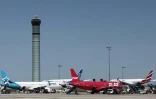 Des avions sur le tarmac de l'aéroport Roissy Charles-de-Gaulle près de Paris, pendant la grève des contrôleurs aériens français, le 3 juillet 2025