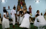 Rituel en l'honneur de l'entité Caboclo, dans le quartier de Realengo à Rio de Janeiro, au Brésil, le 22 février 2025