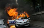 Un véhicule de police incendié le 18 mai 2016 à Paris