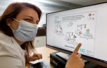 La docteur Mélanie Suppan présente le jeu vidéo "Escape Covid-19"dans le sous-sol de l'hôpital universitaire de Genève, le 10 mai 2021