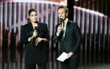 Les maîtres de cérémonie, Léa Salame et Cyril Feraud, sur la scène de la 40e édition des Victoires de la Musique, à la Seine Musicale de Boulogne-Billancourt, près de Paris, le 14 février 2025